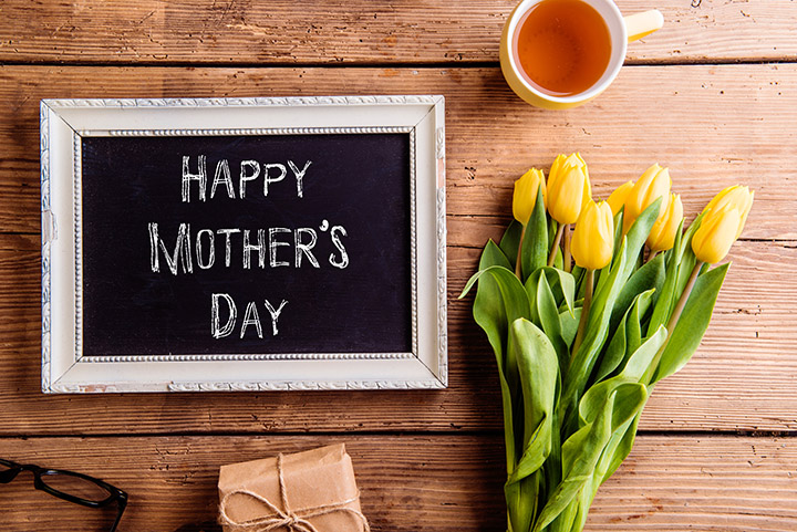 https://thefloridavillager.com/wp-content/uploads/2022/04/mothers-day-composition-picture-frame-with-chalk-sign-bouquet-of-yellow-tulips-gift-an-SBI-305199343-1.jpg
